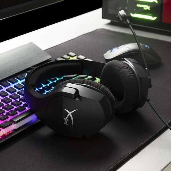 Kingston HyperX Cloud II Wireless headphones on a gaming desk – top wireless headphones for gaming and music lovers. 