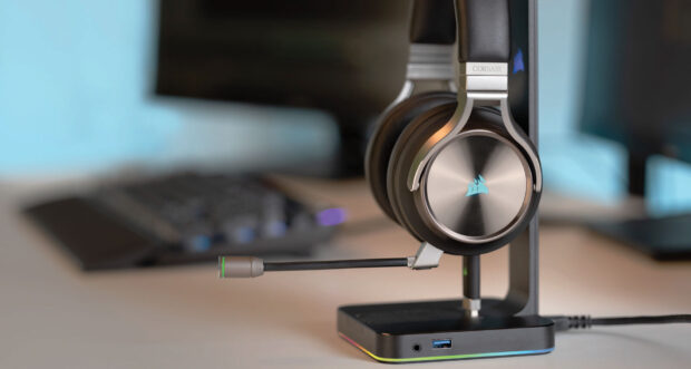 Corsair Virtuoso RGB Wireless SE headphones on a gaming desk – premium headphones for music and gaming enthusiasts. 